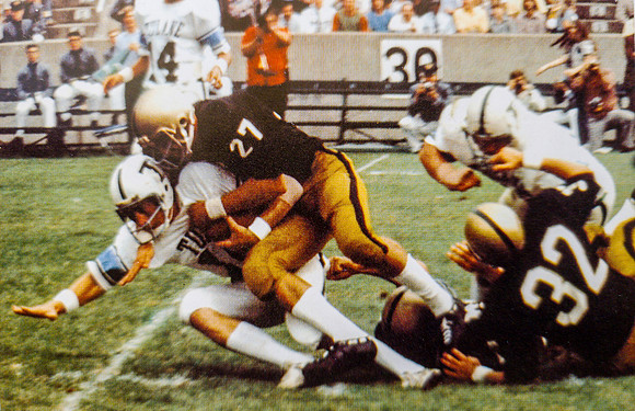 Gary May on the tackle.