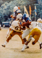 Duke's Gore being tackled by Army's Ford and Bruckner.